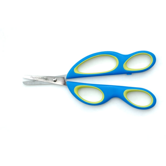 Ciseaux à longue boucle assistés pour gauchers