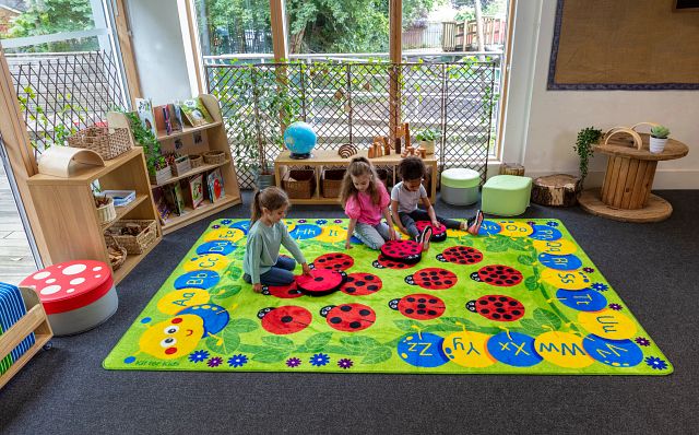 Tapis chenille et coccinelles