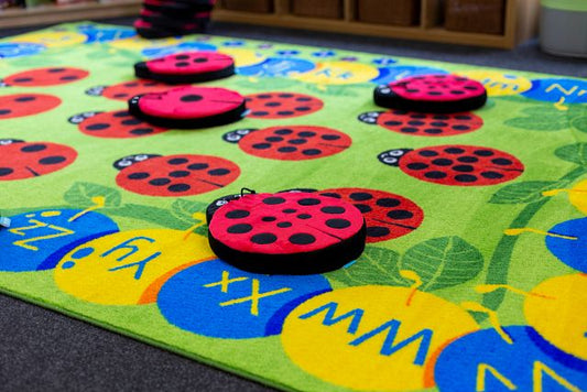 Tapis chenille et coccinelles
